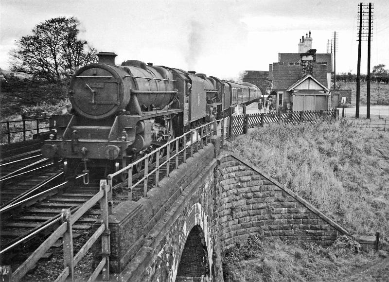 Loco 45122 - Double heading.jpg - Number  45122   - Black Five 4-6-0 - Designed by William Stanier.  Built May 1935 at  Vulcan Foundry  for the LMS Railway.  ( Photo 1950's ) The Black Fives were a mixed traffic locomotive, a "do-anything go-anywhere" type; a total of 842 were built. On the formation of BR in 1948 it was shedded at Inverness. Its last shed was Carlisle Kingmoor.   Withdrawn from service & disposed of in Apr 1964.